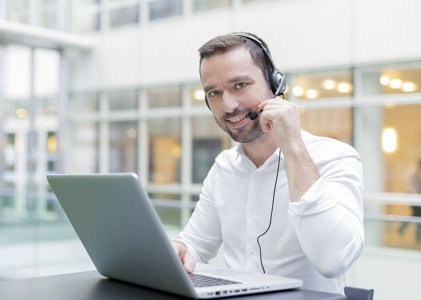 operator speaking with a head set