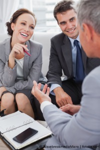 Business people arranging an appointment in cosy meeting room